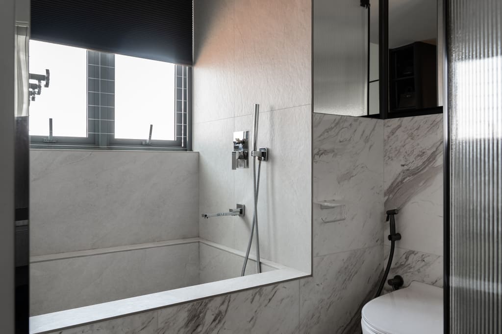 Marble condo bathroom at Bright Hill by MET Interior, showing a premium bathroom renovation cost scope in Singapore
